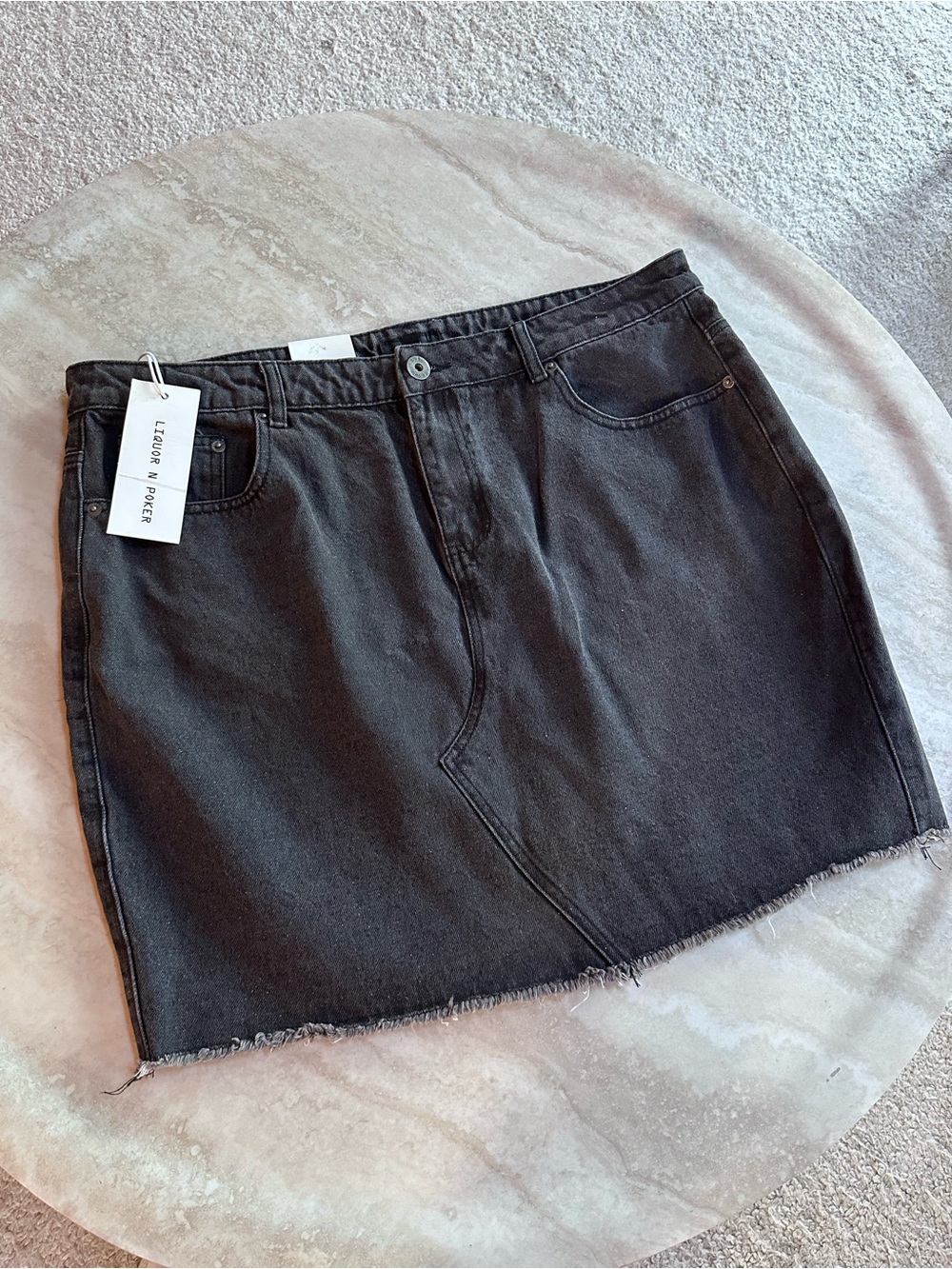 Black Denim Mini Skirt with Raw Hem